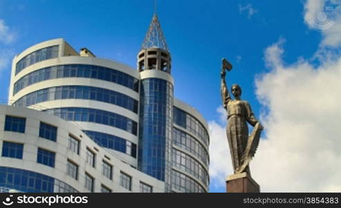 Time lapse of running clouds and skyscrapers. Monument of Eternal Glory to the soldiers, partisans and underground fighters who fell during the Great Patriotic War. Opened October 31, 1967. Sculptors Agibalov V., M. Ovsyankin, architects A. Maksimenko, E.