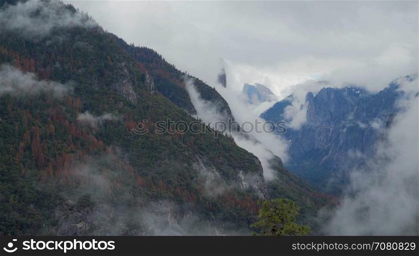 Time lapse of wispy clouds blowing through the Yosemite valley