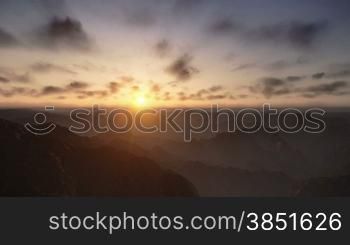 Time Lapse Sunrise over Mountains Peaks