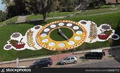 timelapse and real time famous large floral clock at center Kiev, Ukraine, consists of 80 thousand flowers