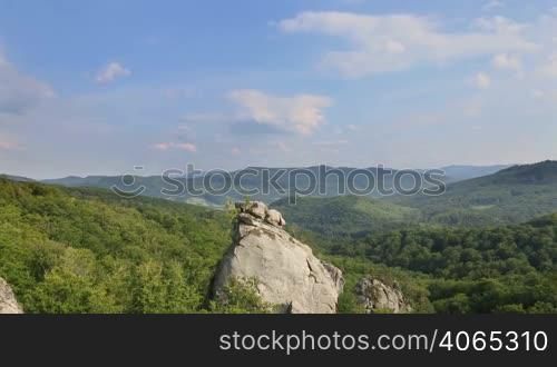 "Timelapse of carpatian mountains and sky, famous place "Dovbush rocks""