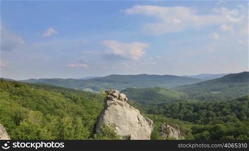 "Timelapse of carpatian mountains and sky, famous place "Dovbush rocks""