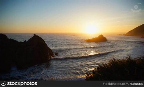 Timelapse of sunset at Pfeiffer beach with the keyhole arch in view