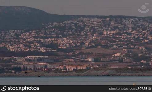 Timelapse shot of evening coming to Thessaloniki, coastal city in Greece