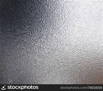tin foil. a very large sheet of crinkled aluminium or tin foil