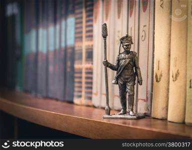 Tin Soldier, Russian foot artillery gunner 1812-1815, year on a bookshelf.