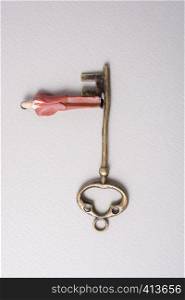 Tiny figurine of man miniature and retro key
