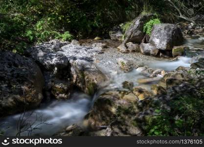 Tiny rapids at the Val Vertova torrent Lombardy near Bergamo in Italy