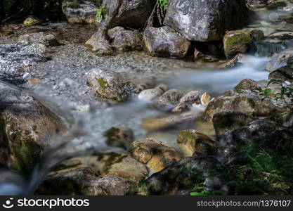 Tiny rapids at the Val Vertova torrent Lombardy near Bergamo in Italy