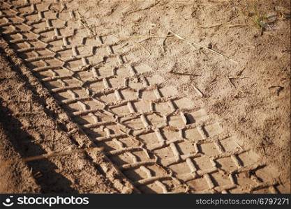 tire tracks on the sand