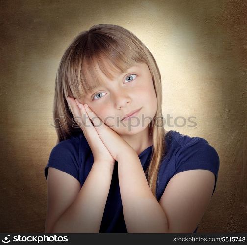 Tired blond girl on a over yellow background