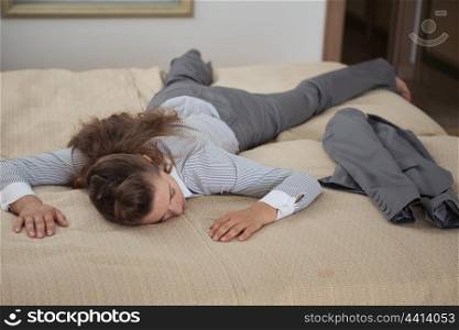 Tired business woman fall down from exhaustion in hotel room