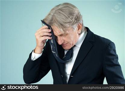 Tired businessman (Attractive seniors isolated on white background series)