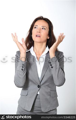 Tired businesswoman on white background