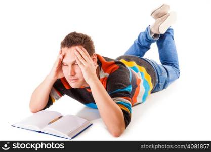 tired college student with book lying on floor preparing studying hard work for exam isolated on white background