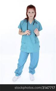 Tired emergency room nurse standing over white. Young woman in teal scrubs with stethoscope.