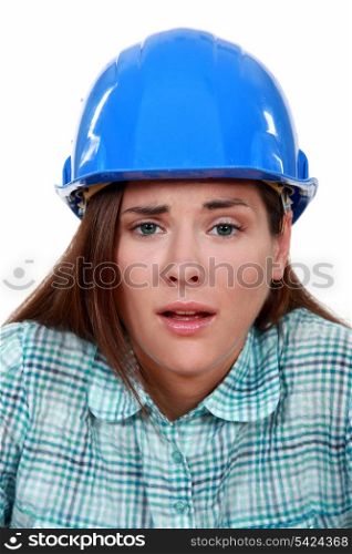 Tired female builder