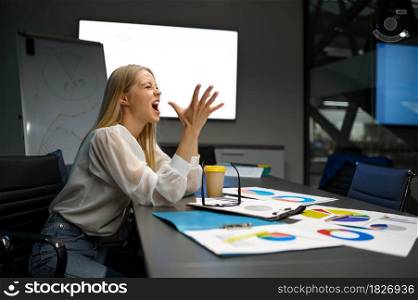 Tired female manager sleeping at the table, IT office. Professional worker, planning or brainstorming. Successful businesswoman works in modern company. Tired female manager sleeping at table, IT office