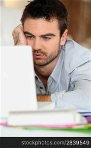 Tired man in front of computer