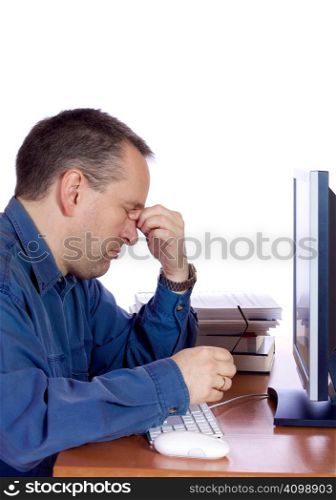Tired man in front of his computer