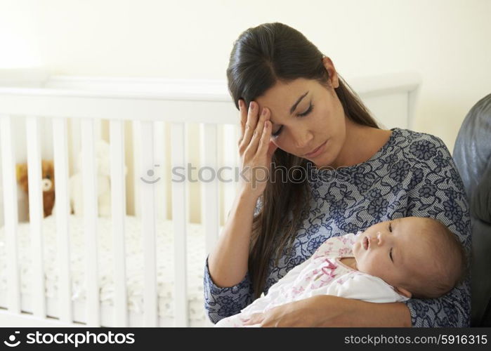 Tired Mother Suffering From Post Natal Depression