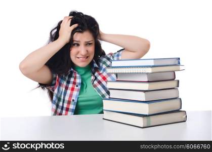 Tired student with textbooks on white