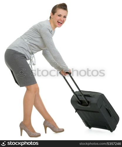 Tired traveling woman hauling suitcase
