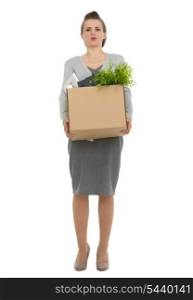Tired woman employee dragging box with personal items