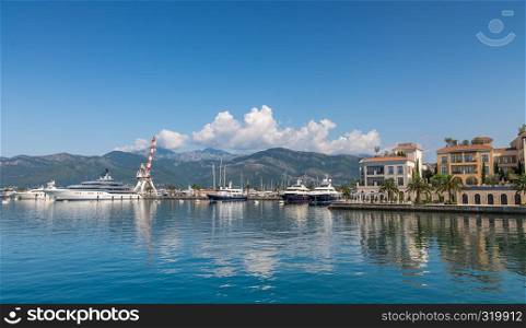 Tivat, Montenegro - 07.11.2018. Embankment of Tivat city, Montenegro, in a sunny summer day. The beginning of the cruise on the Bay of Kotor.. Embankment of Tivat city in Montenegro