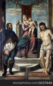 Tiziano Vecellio follower: Madonna and Child on the throne with St. Roch and St. Sebastian, exhibited at the Great Masters Renaissance in Croatia in Zagreb, Croatia