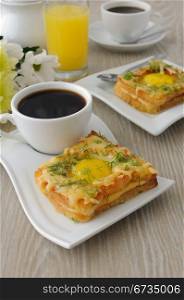 Toast with egg and cheese with dill and a cup of coffee