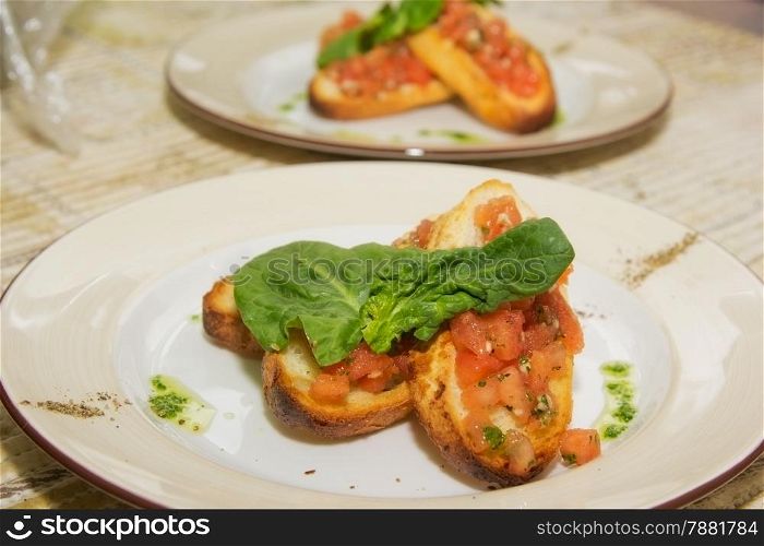 toast with red fish on a plate