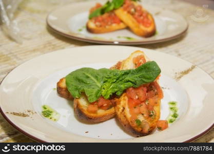 toast with red fish on a plate