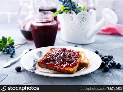 toasts and blueberry jam for the breakfast
