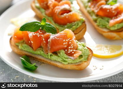 Toasts with salted salmon and avocado guacamole