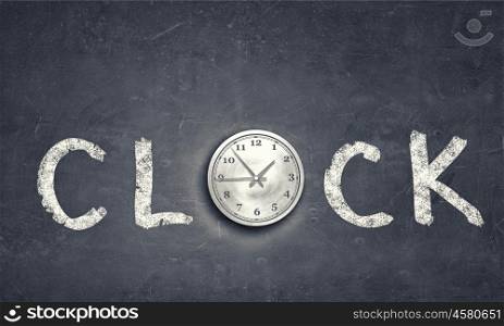 Today and now. Conceptual image with word clock on gray background