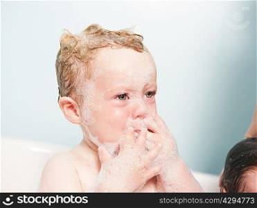 Toddler crying in bubble bath