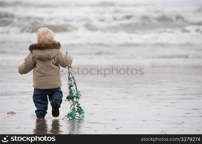 Toddler on the beach.