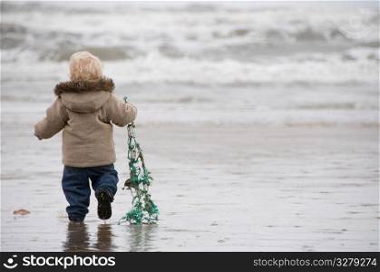 Toddler on the beach.