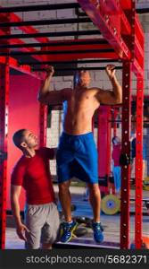Toes to bar man pull-ups personal trainer 2 bars workout