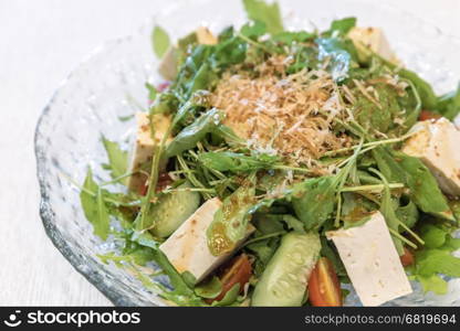 Tofu Salad with Arugula and onsen egg