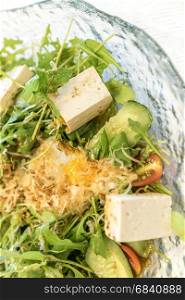 Tofu Salad with Arugula and onsen egg
