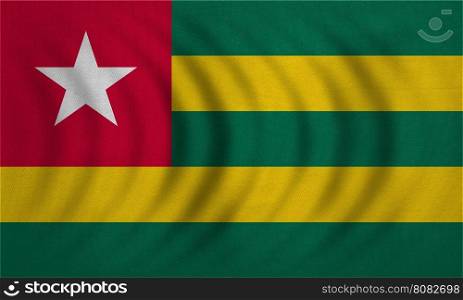 Togolese national official flag. African patriotic symbol, banner, element, background. Correct colors. Flag of Togo wavy with real detailed fabric texture, accurate size, illustration