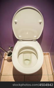 Toilet seat in modern room