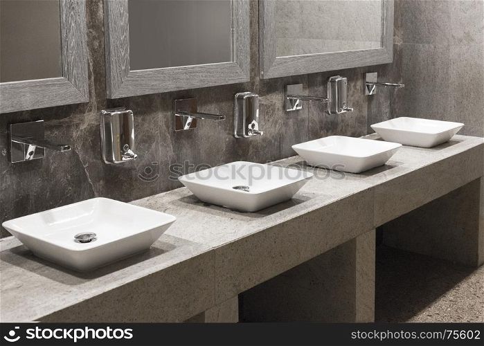 Toilet sink interior of men public toilet