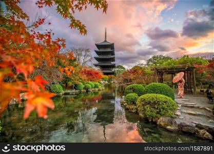 Toji temple and wood pagoda in autumn Kyoto, Japan sunset