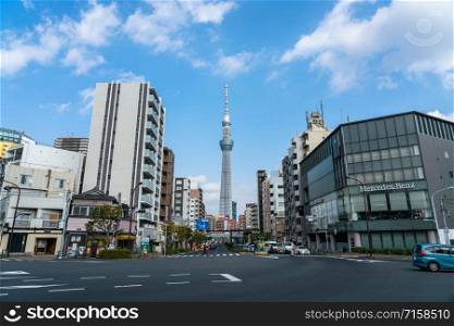 TOKYO, JAPAN - FEB 2019 : Tokyo sky tree locate on the street on Febuary 18, 2019, Tokyo, Japan, It is currently the tallest building in Japan and the world