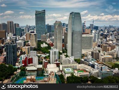 TOKYO, JAPAN - JUNE 10: View at modern skyscrapers in Roppongi district in Minato, Tokyo at June 10, 2015. This district is well known as the city's most popular nightlife district.