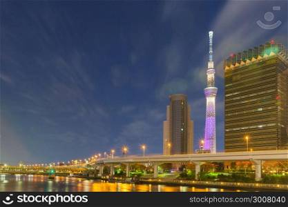 Tokyo sky tree at night. bridge and road in night. building night time.