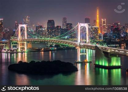 Tokyo skyline with Tokyo tower and rainbow bridge. Tokyo, Japan.